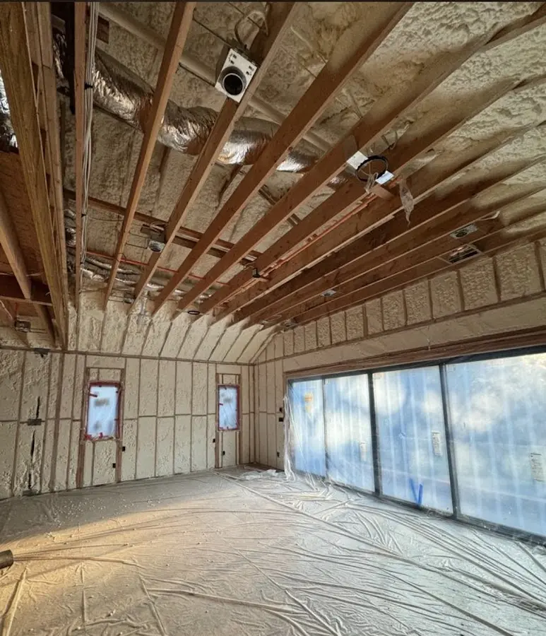 Interior walls and ceiling insulated with spray foam during new construction in Dallas